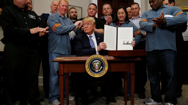donald trump signs tariffs 