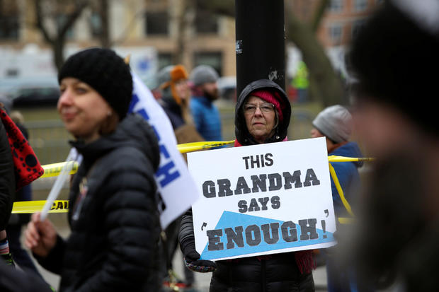 Noreen Haiduk holds a sign as she attends the "March for Our Lives" event after recent school shootings, at a rally in Chicago 