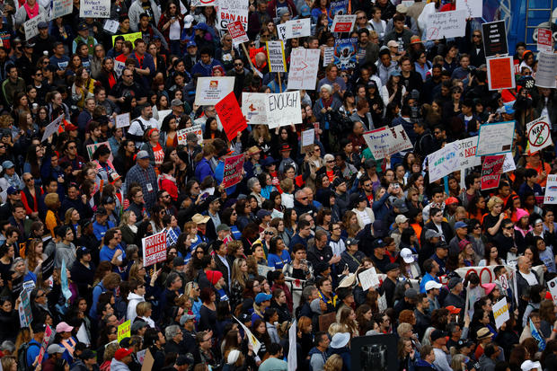 People gather during the "March for Our Lives", an organized demonstration to end gun violence, in downtown Los Angeles, California 
