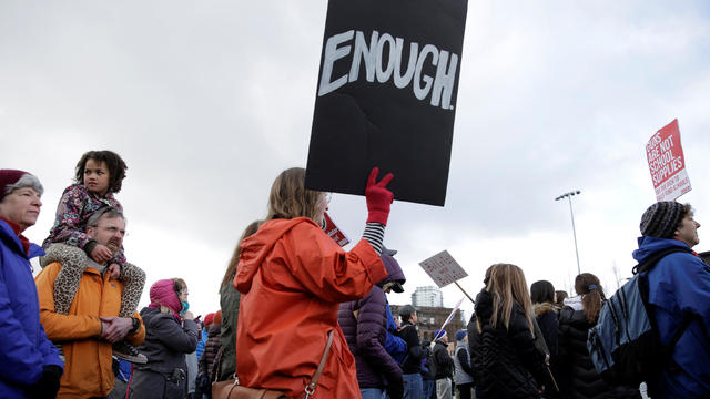 Parople gather during a "March For Our Lives" demonstration demanding gun control in Seattle 