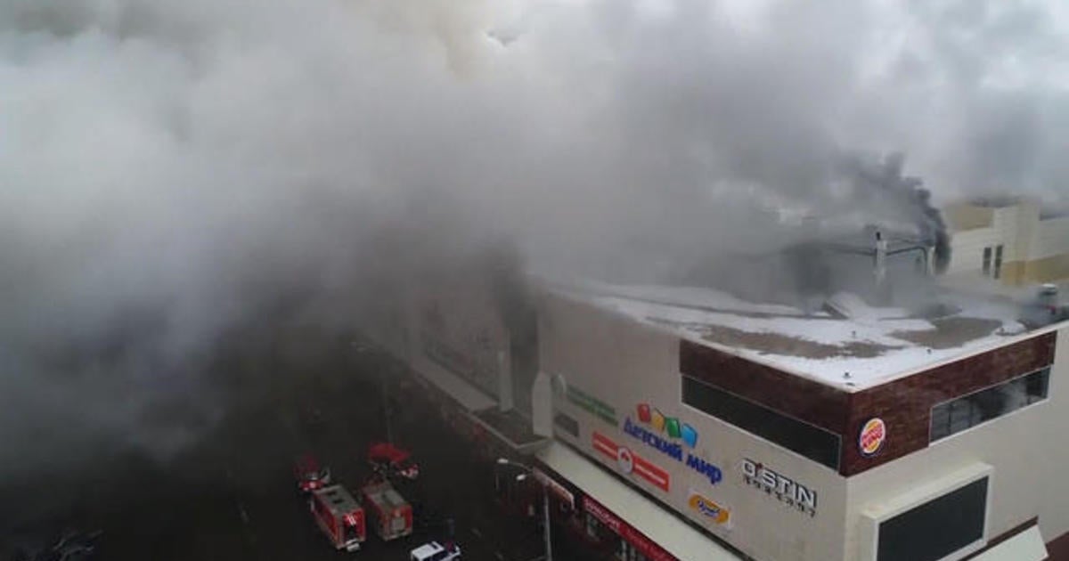 Russia shopping mall fire kills at least 64 people - CBS News