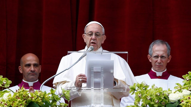 Pope Francis delivers his Easter message in the Urbi et Orbi (to the city and the world) address from the balcony overlooking St. Peter's Square at the Vatican 