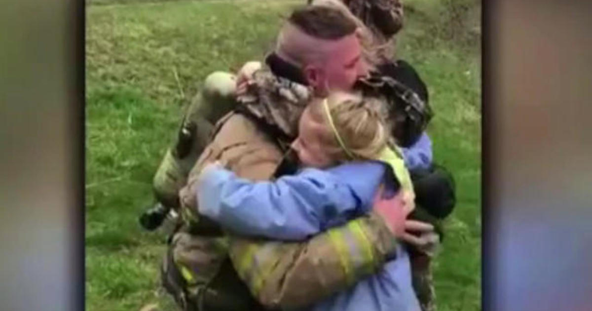 Returning Soldier Surprises Daughters By Dressing Up Like Firefighter Cbs News