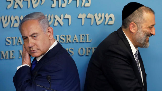 Israeli Prime Minister Benjamin Netanyahu and Israeli Interior Minister Aryeh Deri are seen at the end of a news conference at the Prime Minister's office in Jerusalem 