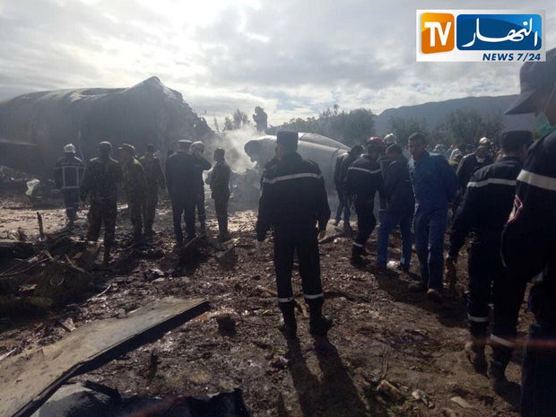 An Algerian military plane is seen after crashing near an airport outside the capital, Algiers, on April 11, 2018, in this still image taken from a video.