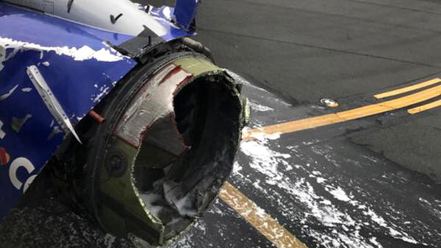 An engine on Southwest Airlines Flight 1380 is seen after the Boeing 737 made an emergency landing at Philadelphia International Airport on April 17, 2018. 