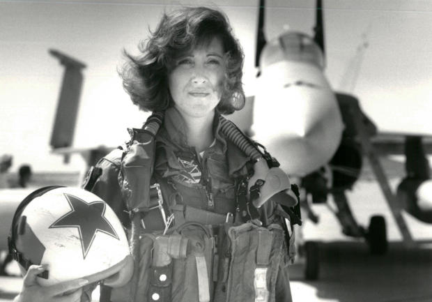 U.S. Navy Lt. Tammie Jo Shults poses in front of a Navy F/A-18A in this 1992 photo released in Washington April 18, 2018. 