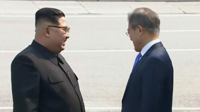 cbsn-fusion-north-korean-leader-takes-first-steps-in-south-as-talks-begin-thumbnail-1555960-640x360.jpg 