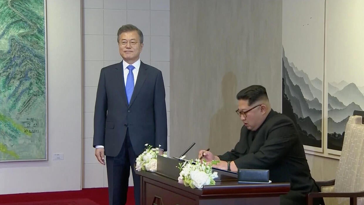 Kim Jong Un, Moon Jae-in 