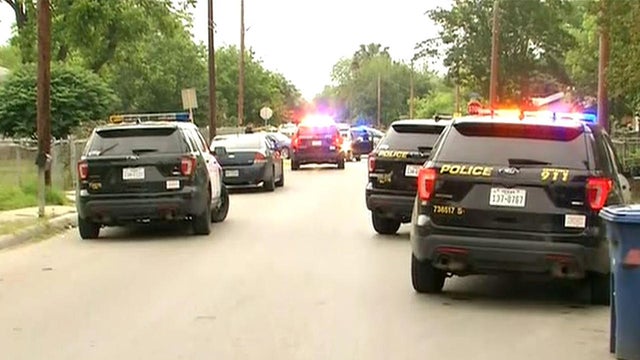 Crews work the scene after a Homeland Security operation in San Antonio, Texas, on May 1, 2018. 