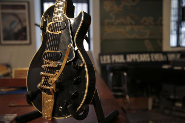 The Les Paul guitar known as "Black Beauty", which will go up for auction next month, is seen in the offices of Guernsey's Auctions President Arlan Ettinger in New York 