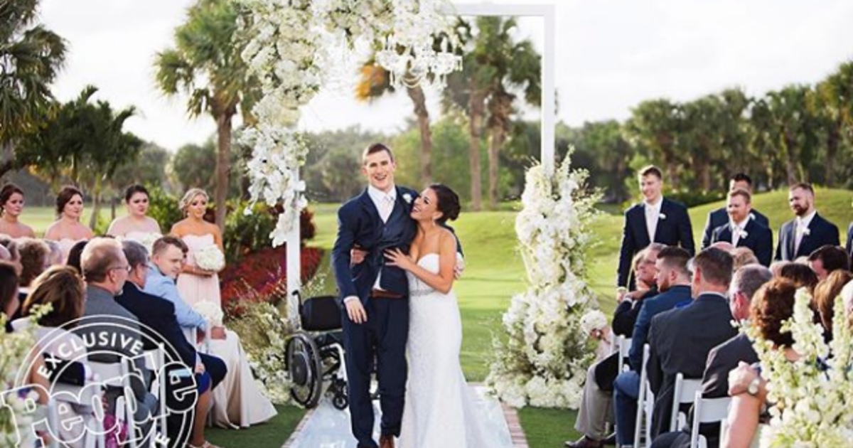 paralyzed-football-player-defies-odds-walks-down-the-aisle-at-his