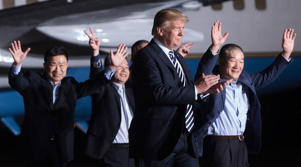 President Donald Trump with Americans freed from North Korea 