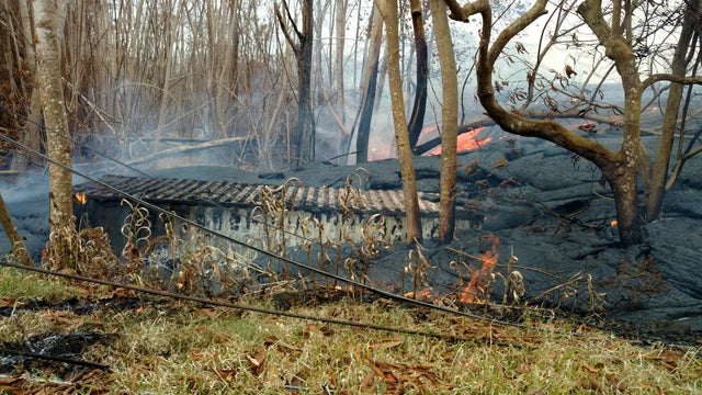 Lava is seen spewing from fissures in Pahoa, Hawaii 