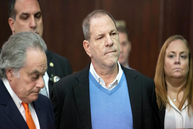 Film producer Harvey Weinstein stands with his lawyer Benjamin Brafman, left, inside Manhattan Criminal Court during his arraignment in Manhattan in New York May 25, 2018. 