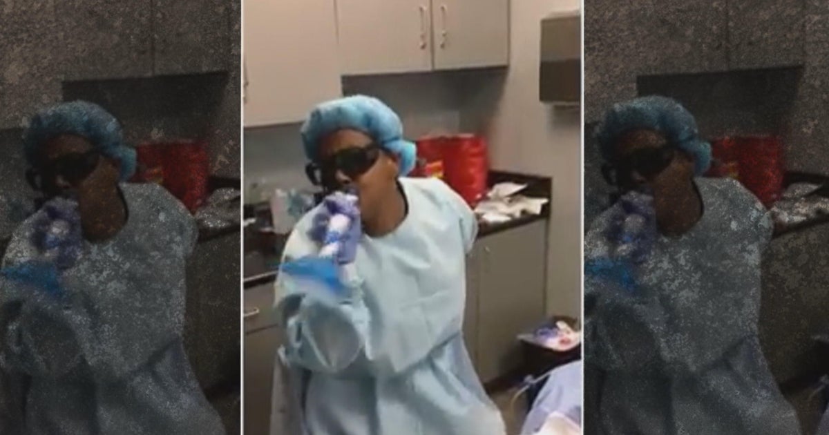 Doctor seen singing and dancing during surgery called "threat to public safety" - CBS News