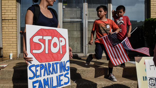 People participate in a protest against recent U.S. immigration policy that separates children from their families when entering the United States as undocumented immigrants in front of a Homeland Security facility in Elizabeth 