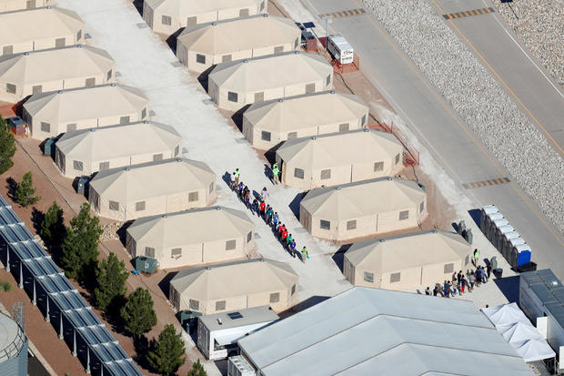 Immigrant children, many of whom have been separated from their parents under a new "zero tolerance" policy by the Trump administration, are being housed in tents next two the Mexican border in Tornillo, Texas 
