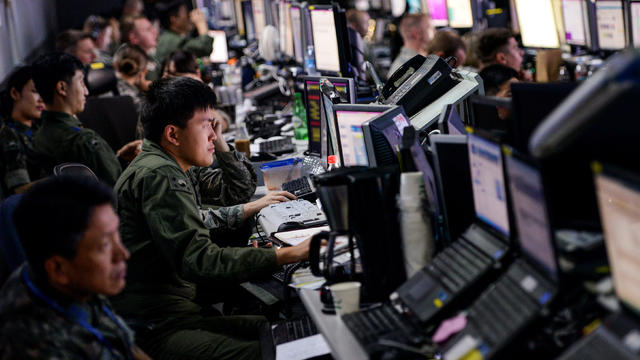 Members from U.S. and Republic of Korea militaries man the Hardened Theater Air Control Center during the first day of Ulchi Freedom Guardian at Osan Air Base South Korea 