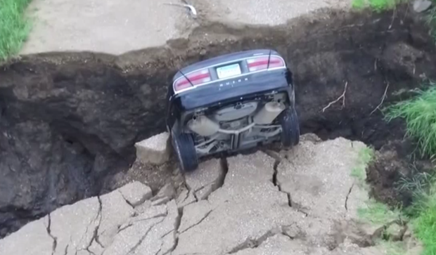 car in sinkhole 