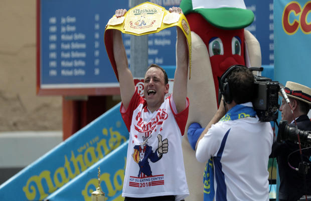 Joey Chestnut wins the annual Nathan's Famous hot dog eating contest, setting a new world record by eating 74 hot dogs in Brooklyn, New York, July 4, 2018. 