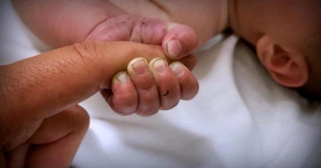 Officers speak about saving baby found buried alive CBS News