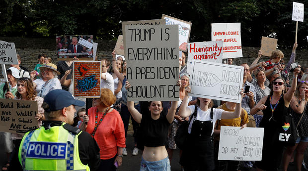 Demonstrators protest outside the grounds of Blenheim Palace, where U.S. President Donald Trump and the First Lady Melania Trump are attending a dinner with Britain's Prime Minister Theresa May and business leaders, near Oxford 