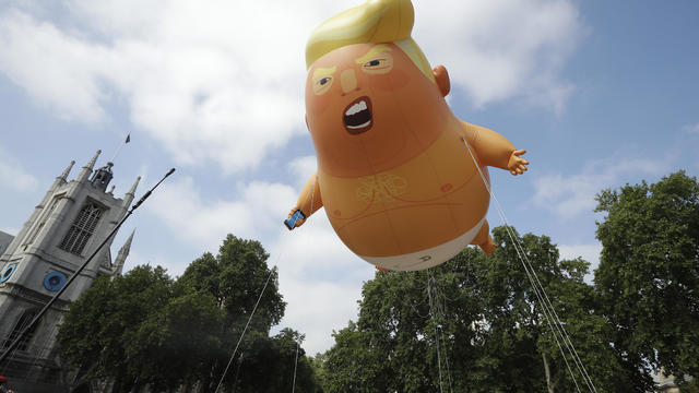 Demonstrators protest outside the grounds of Blenheim Palace, where U.S. President Donald Trump and the First Lady Melania Trump are attending a dinner with Britain's Prime Minister Theresa May and business leaders, near Oxford 