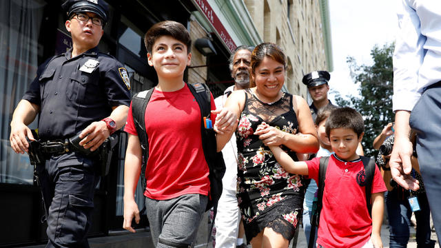 Yeni Gonzalez Garcia, a Guatemalan mother who had been separated from her children, exits the Cayuga Center after being reunited with them in New York 