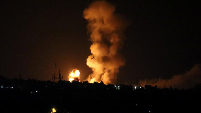 Explosion is seen following an Israeli air strike in the southern Gaza Strip 