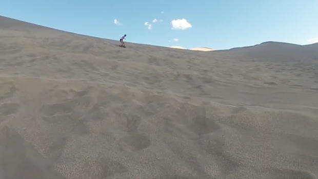 sandboarding-very-tall-sand-dunes-620.jpg 