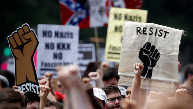 People protest the white supremacist Unite the Right rally held in downtown Washington, DC, U.S. 