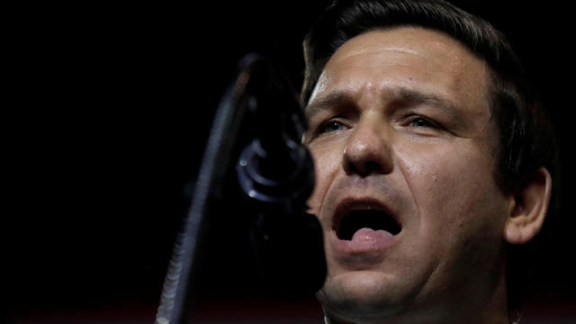 FILE PHOTO: Republican Florida governor candidate Ron DeSantis speaks during a Make America Great Again Rally at the Florida State Fairgrounds in Tampa, Florida, U.S. 