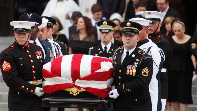 An Honor Guard carries the casket of the late Senator John McCain from the Washington National Cathedral in Washington 