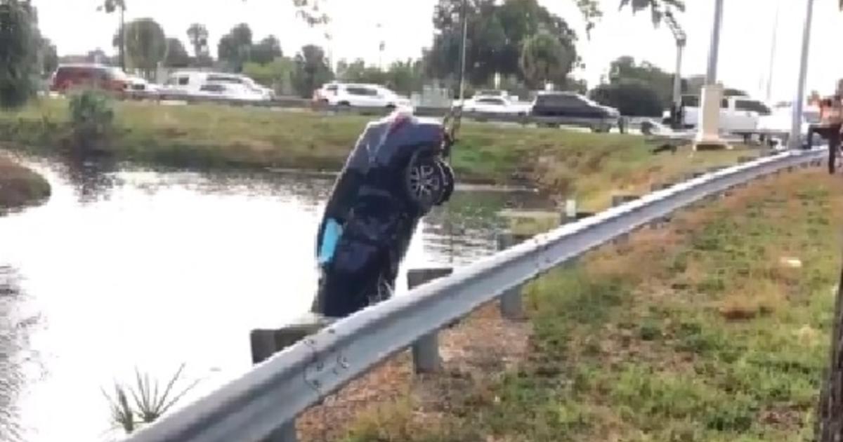 Car Crashes Into Northwest Miami Dade Canal After Hit And Run Cbs Miami 