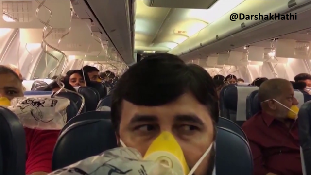 Oxygen masks are seen deployed after a loss of cabin pressure, on a Jet Airways flight, from Mumbai 