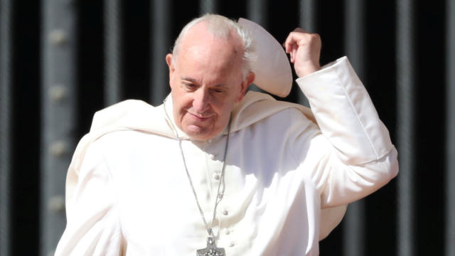 Pope Francis loses his skull cap during the Wednesday general audience in Saint Peter's square at the Vatican 