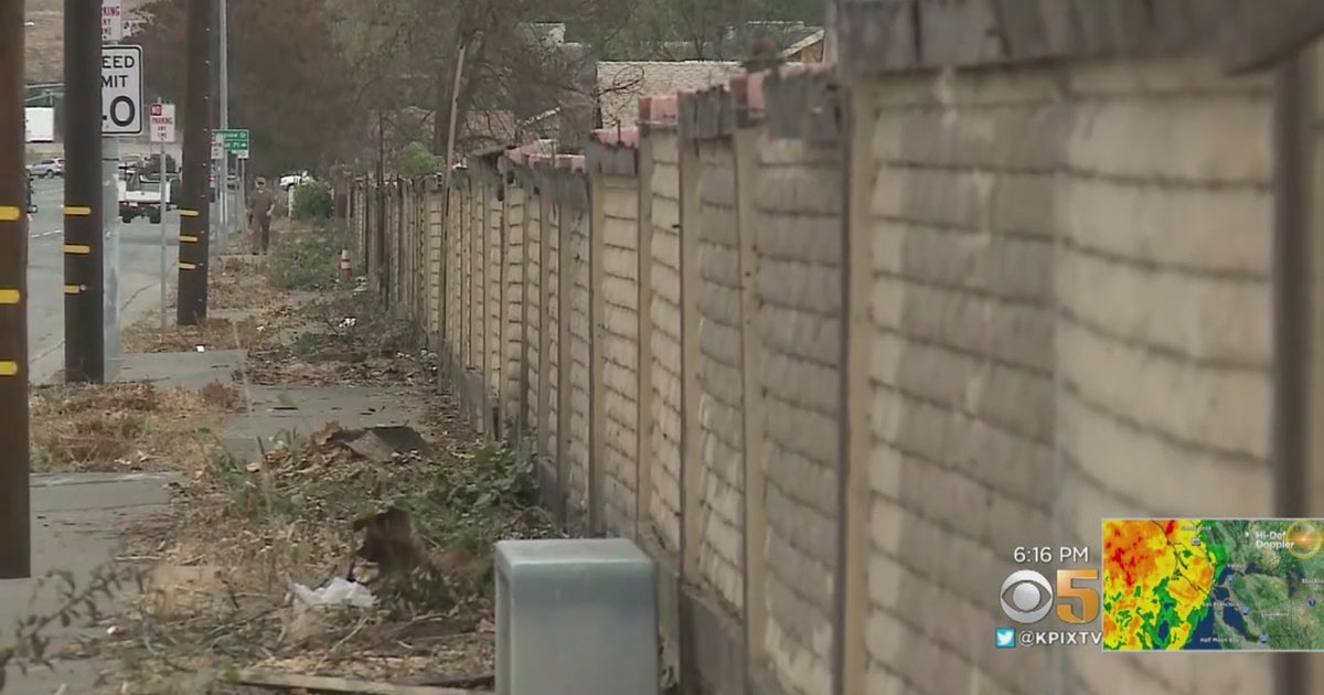 Embattled DebrisRemoval Company Helps Rebuild Wall Destroyed In