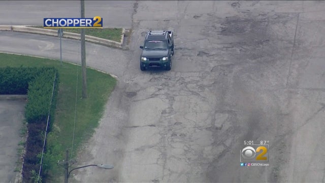 ford-city-drive-potholes.jpg 