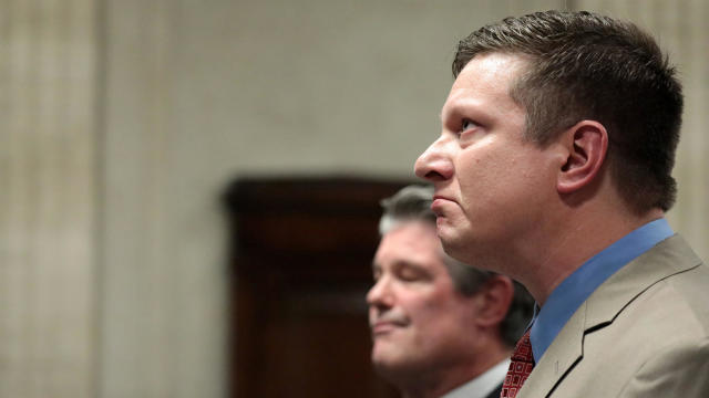 Chicago Police Officer Jason Van Dyke becomes emotional and then holds it back as he is questioned by the judge following the closing arguments in his murder trial at the Leighton Criminal Court Building in Chicago, Illinois, Oct. 4, 2018. 