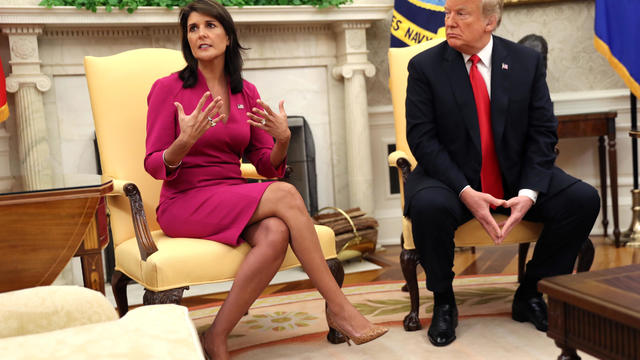 Outgoing U.S. Ambassador to the U.N. Haley talks with U.S. President Trump in the Oval Office of the White House in Washington 