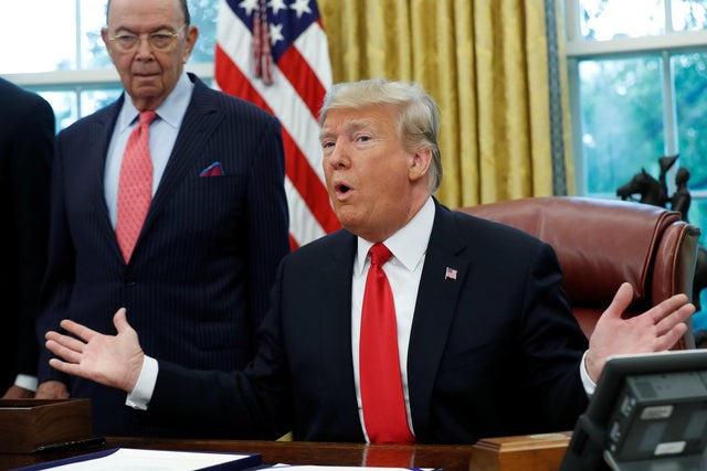 President Trump speaks about Hurricane Michael prior to signing a bill into law at the White House in Washington Oct. 11, 2018.