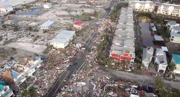 An aerial view shows debris strewn over streets after Hurricane Michael blew through Mexico Beach, Florida 