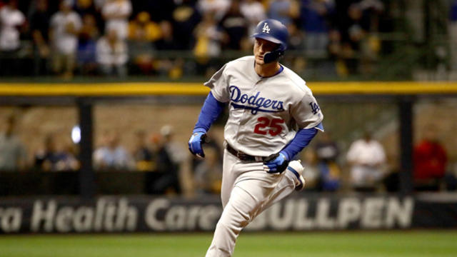 Be inspired by this fan's gigantic Dodger Blue mohawk at NLCS Game 4