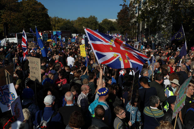 Protesters participating in an anti-Brexit demonstration, march through central London 