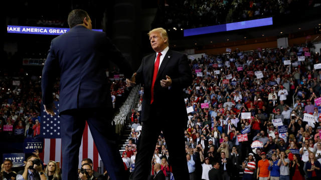 U.S. President Trump greets U.S. Senator Cruz (R-TX) at a campaign rally in Houston 