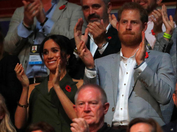 Britain's Prince Harry and Meghan, Duchess of Sussex, at the Invictus Games Sydney closing ceremony 