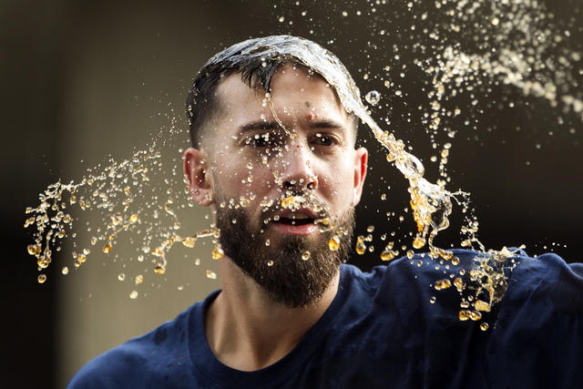 Here's the video of a Red Sox World Series trophy getting hit with a thrown  beer