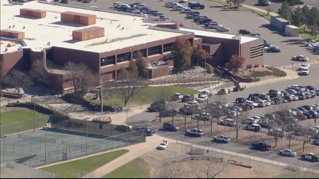 Man arrested after shots fired in pickup line outside of an Aurora high ...