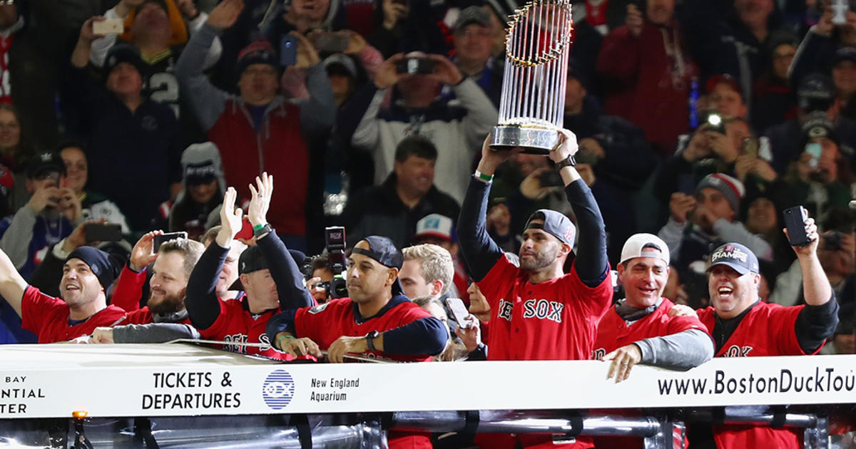 Red Sox bring World Series trophy to Bruins game